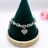 bracelet argent maille cable trois pendentifs coeurs orné d'oxydes l19,5cm argent 925 millième (22 ct) 23,26g
