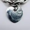 bracelet argent maille cable trois pendentifs coeurs orné d'oxydes l19,5cm argent 925 millième (22 ct) 23,26g