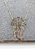 collier fin en or avec un pendentif "attrape rèves" motif vidé or 750 millième (18 ct) 1,38g