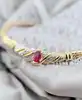 collier or centré un motif en 2 ors orné d'un rubis et de petits diamants or 750 millième (18 ct) 13,21g