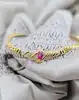 collier or centré un motif en 2 ors orné d'un rubis et de petits diamants or 750 millième (18 ct) 13,21g