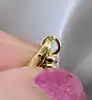 collier or centré un motif en 2 ors orné d'un rubis et de petits diamants or 750 millième (18 ct) 13,21g