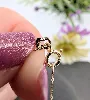 collier or maille forçat fine orné de 5 anneaux limés or 750 millième (18 ct) 1,34g