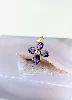 pendentif croix en améthystes facettées centré d'un oxyde or 750 millième (18 ct) 1,98g