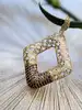 pendentif motifs ajourés serti de pierres marrons or 750 millième (18 ct) 3,91g