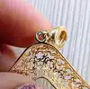 pendentif motifs ajourés serti de pierres marrons or 750 millième (18 ct) 3,91g