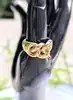 bague maille chaîne dont le maillon central mobile or 750 millième (18 ct) 13,41g