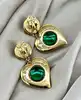 boucles d'oreilles pendantes clip vintage yves saint laurent motif coeurs verts, bleus et dorés