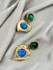 boucles d'oreilles pendantes clip vintage yves saint laurent motif coeurs verts, bleus et dorés