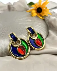 boucles d'oreilles pendqntes clip yves saint laurent en métal doré