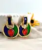 boucles d'oreilles pendqntes clip yves saint laurent en métal doré