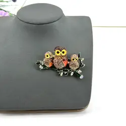 broche hiboux sur branche pavée d'oxydes