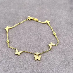 chaîne de cheville plaqué or motif papillon, pavé d'oxydes blancs