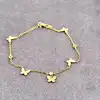 chaîne de cheville plaqué or motif papillon, pavé d'oxydes blancs