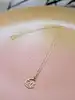 collier or orné d'un pendentif allah forme lune & étoile ajouré or 750 millième (18 ct) 1,48g