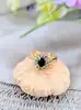 bague marguerite en or centrée d'un saphir entouré de 12 diamants or 750 millième (18 ct) 4,19g