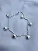 bracelet en argent avec 6 pendentifs en forme de coeur l18cm argent 925 millième (22 ct) 5,46g