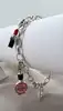 bracelet thomas sabo avec 3 charms ( rouge à lèvres, coeur, flacon de vernis à ongles ) argent 925 millième (22 ct) 16,46g