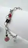 bracelet thomas sabo avec 3 charms ( rouge à lèvres, coeur, flacon de vernis à ongles ) argent 925 millième (22 ct) 16,46g