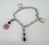 bracelet thomas sabo avec 3 charms ( rouge à lèvres, coeur, flacon de vernis à ongles ) argent 925 millième (22 ct) 16,46g