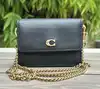 coach mini sac en cuir grainé noir avec chaîne dorée amovible