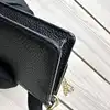 coach mini sac en cuir grainé noir avec chaîne dorée amovible