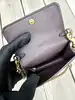 coach mini sac en cuir grainé noir avec chaîne dorée amovible