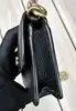 coach mini sac en cuir grainé noir avec chaîne dorée amovible