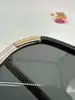 lunettes de soleil prada spr20x avec des verres noirs