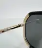 lunettes de soleil prada spr20x avec des verres noirs