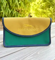 mini pochette longchamp en toile jaune verte et rouge, et la doublure en cuir