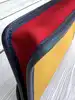 mini pochette longchamp en toile jaune verte et rouge, et la doublure en cuir