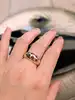 bague bombée sertie d'1 rubis, 5 saphirs, 2 petits diamants et 2 pierres de couleur or 750 millième (18 ct) 9,38g