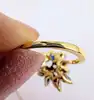bague cocktail sertie de 6 saphirs navettes et 6 petits diamants taille brillant or 750 millième (18 ct) 4,80g
