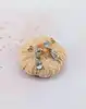 boucles d'oreilles pendantes en or blanc chacune sertie de deux topaze bleue forme goutte or 750 millième (18 ct) 1,82g