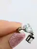 boucles d'oreilles pendantes en or blanc chacune sertie de deux topaze bleue forme goutte or 750 millième (18 ct) 1,82g