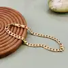 bracelet maille goumette en métal doré