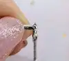 chaine maille palmier orné d'un pendentif en or blanc serti d'un petit diamant d'environ 0,03ct or 750 millième (18 ct) 4,18g