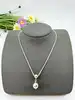 parure en argent collier avec un pendentif double boule et boucles d'oreilles assorties argent 925 millième (22 ct) 13,77g