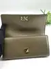 portefeuille michael kors carryall en cuir vert olive