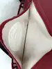 sac besace bandoulière lacoste rouge et bleu marine