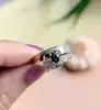 bague croisée en 2 ors centrée d'un saphir et 2 petits diamants or 750 millième (18 ct) 2,65g