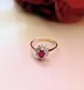 bague pierre rouge et oxydes or 750 millième (18 ct) 2,38g
