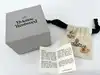 boucles d'oreilles vivienne westwood modèle harlequin orb doré et blanc
