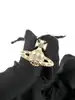 boucles d'oreilles vivienne westwood modèle harlequin orb doré et blanc