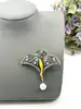broche en émail fée en métal doré