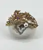 broche éventail à motif floral