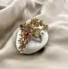 broche éventail à motif floral