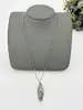 collier thomas sabot maille gourmette avec pendentif plume argent 925 millième (22 ct) 11,69g