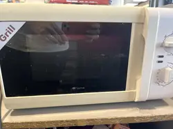 four micro ondes carrefour hmg20d-12